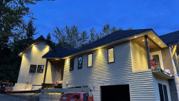New custom home in Ridgefield, WA, with exterior soffit lighting. Full electrical from rough-in to finish.