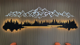 Custom backlit LED mountain feature wall, wired and installed in Portland, OR.
